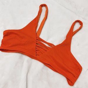 Bright orange swim top